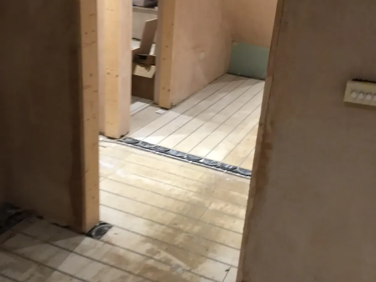 Underfloor heating installation during a major residential refurbishment